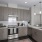 a kitchen with a red rug