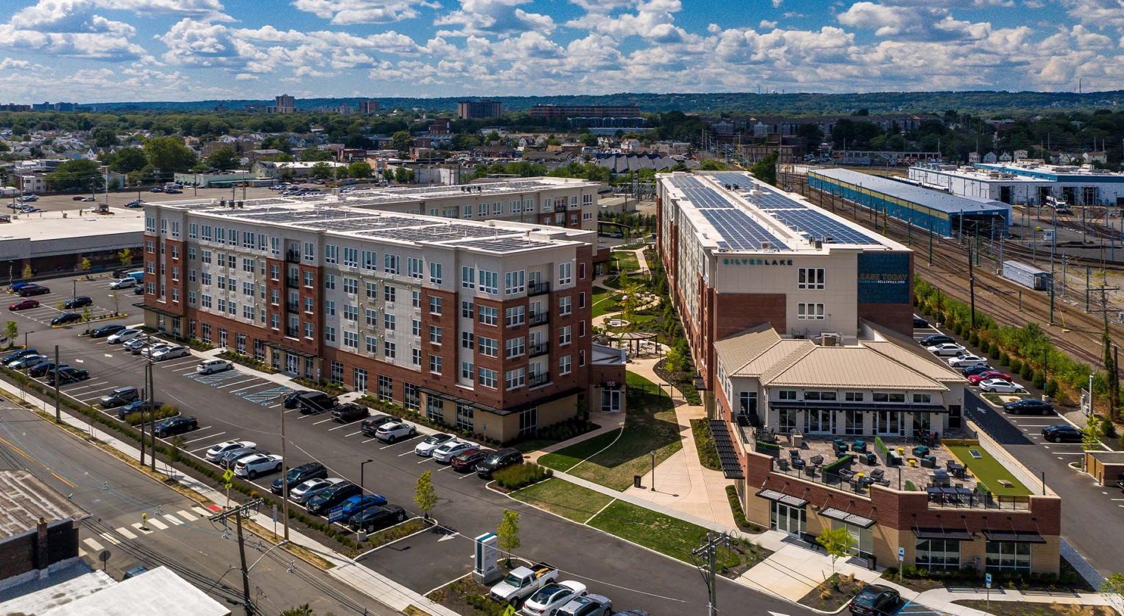 The essence of exceptional living a high angle view of a building and a parking lot