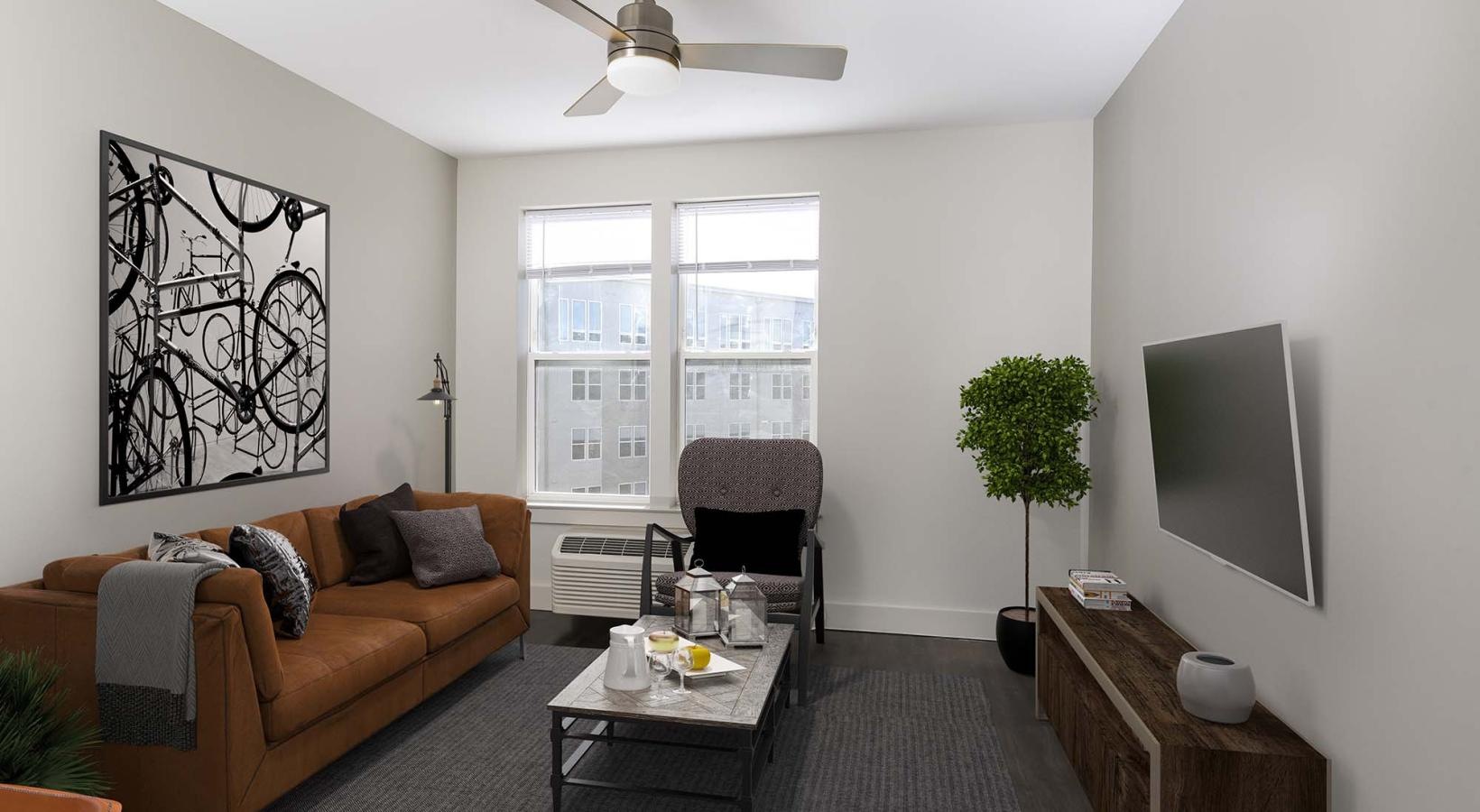 Generous living spaces with beautiful natural lighting a living room with a couch and a table