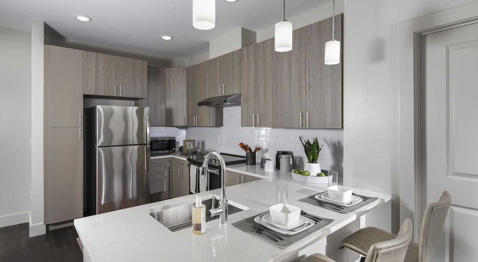 Beautiful kitchens with designer finishes a kitchen with a marble counter top