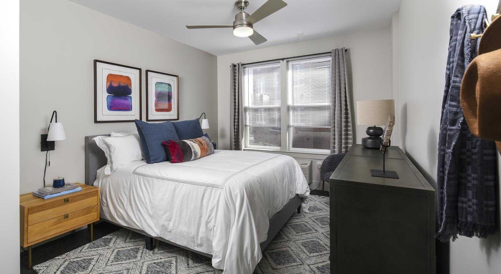 Bedroom options to fit every lifestyle a bedroom with a bed and a dresser