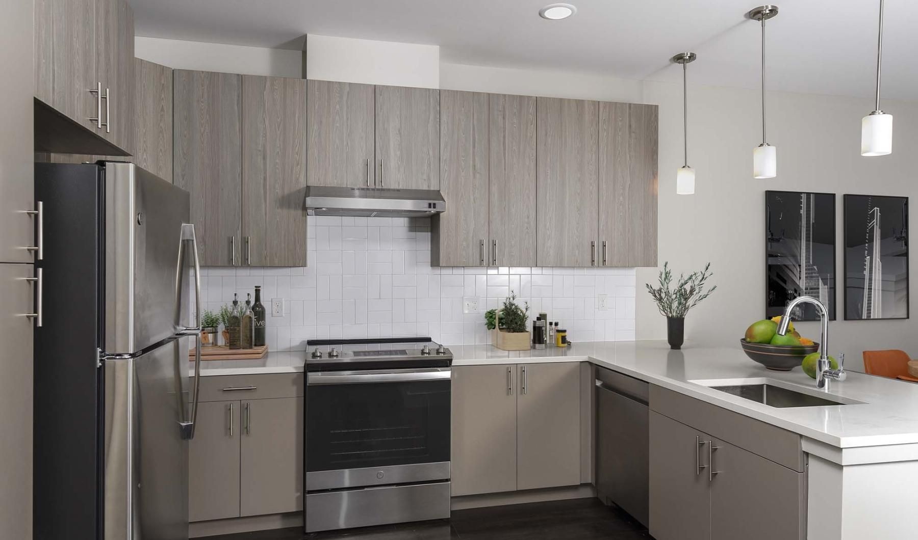 a kitchen with white cabinets