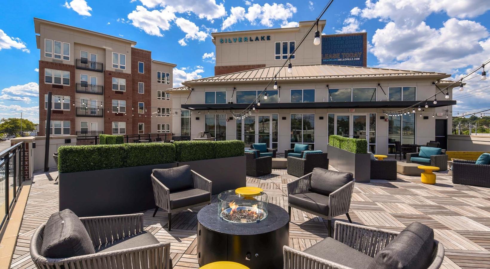 Cutting-edge amenities at your fingertips a courtyard with a table and chairs