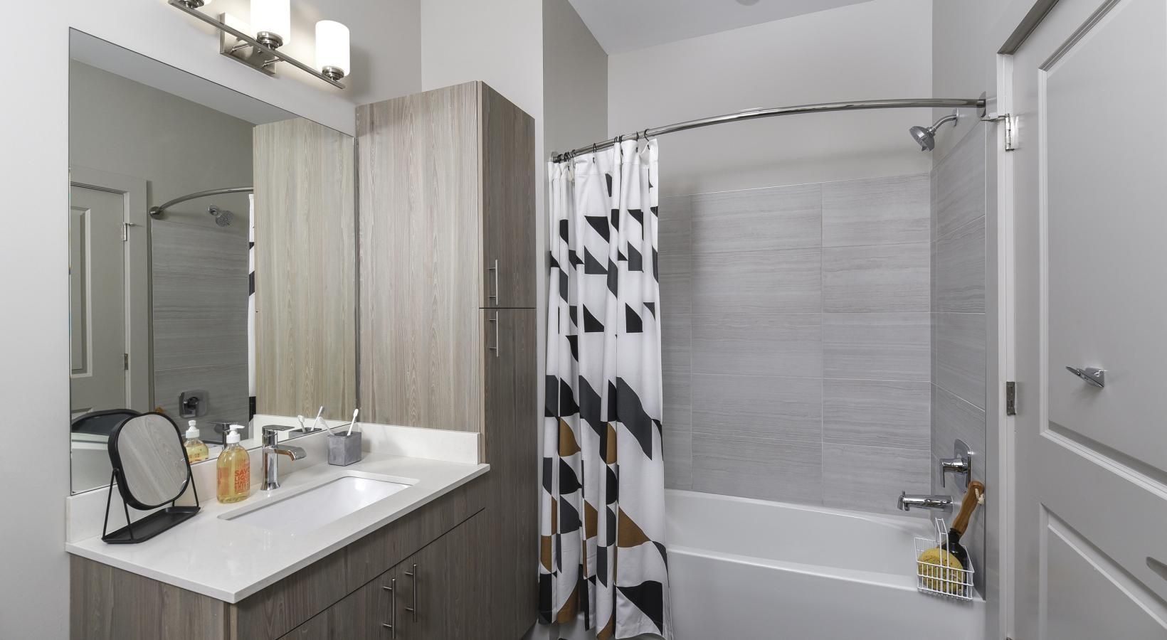 Bathroom options with thoughtful details a bathroom with a tub sink and shower