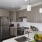 a kitchen with a marble counter top
