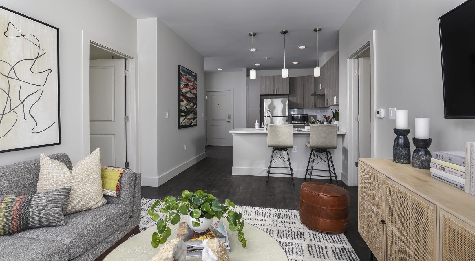 Relax and unwind in stylish living spaces a living room with a table and chairs