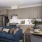a kitchen and a living room with a blue couch