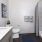 a bathroom with a tub toilet and sink